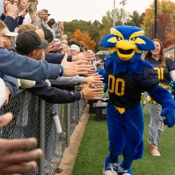 Blu on sidelines at HOCO football game 